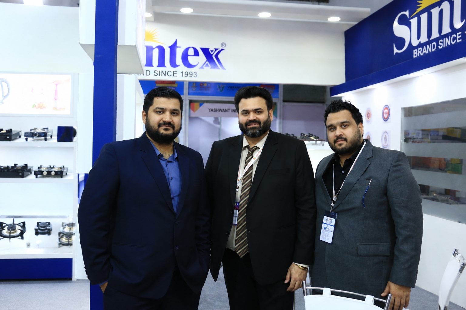 The three Malhotra brothers at the Vibrant India exhibition